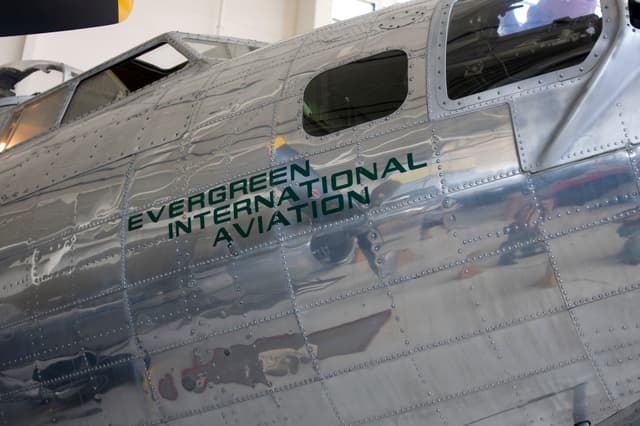 Vintage aircraft with 'Evergreen International Aviation' written on the side