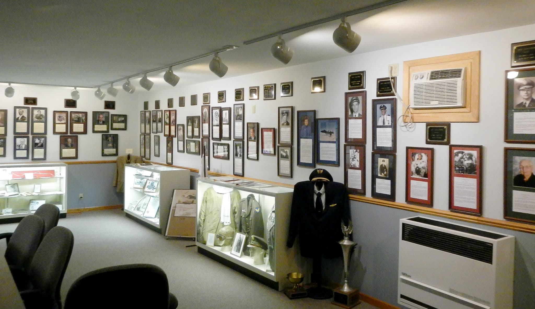 Plaques and flight attire on display inside the Iowa Aviation Museum