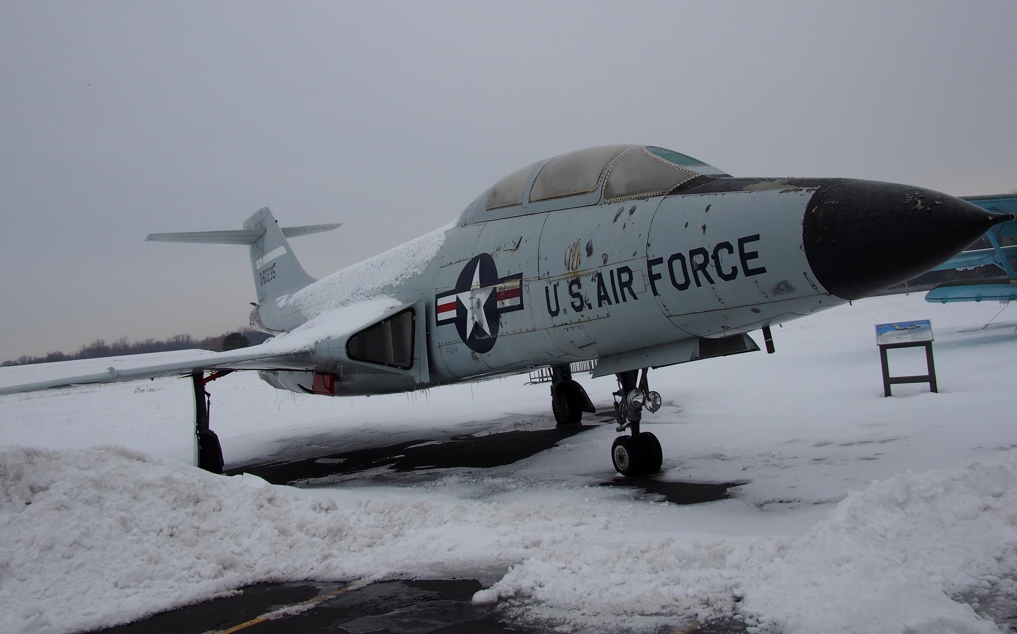 McDonnell F-101 partially covered in snow at the Michigan Flight Museum