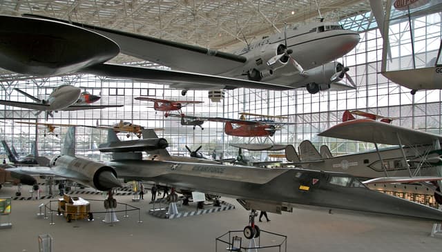 Various aircraft hanging on display inside the Museum of Flight