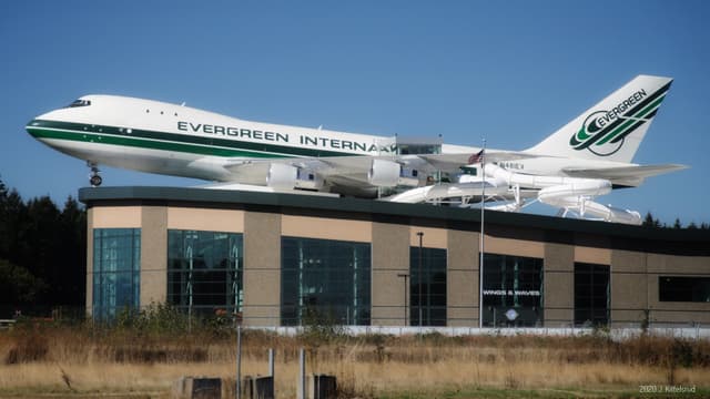 Water slides emerging from a Boeing 747 on the roof of Wings and Waves Waterpark